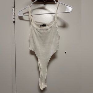 High cropped body suit size S